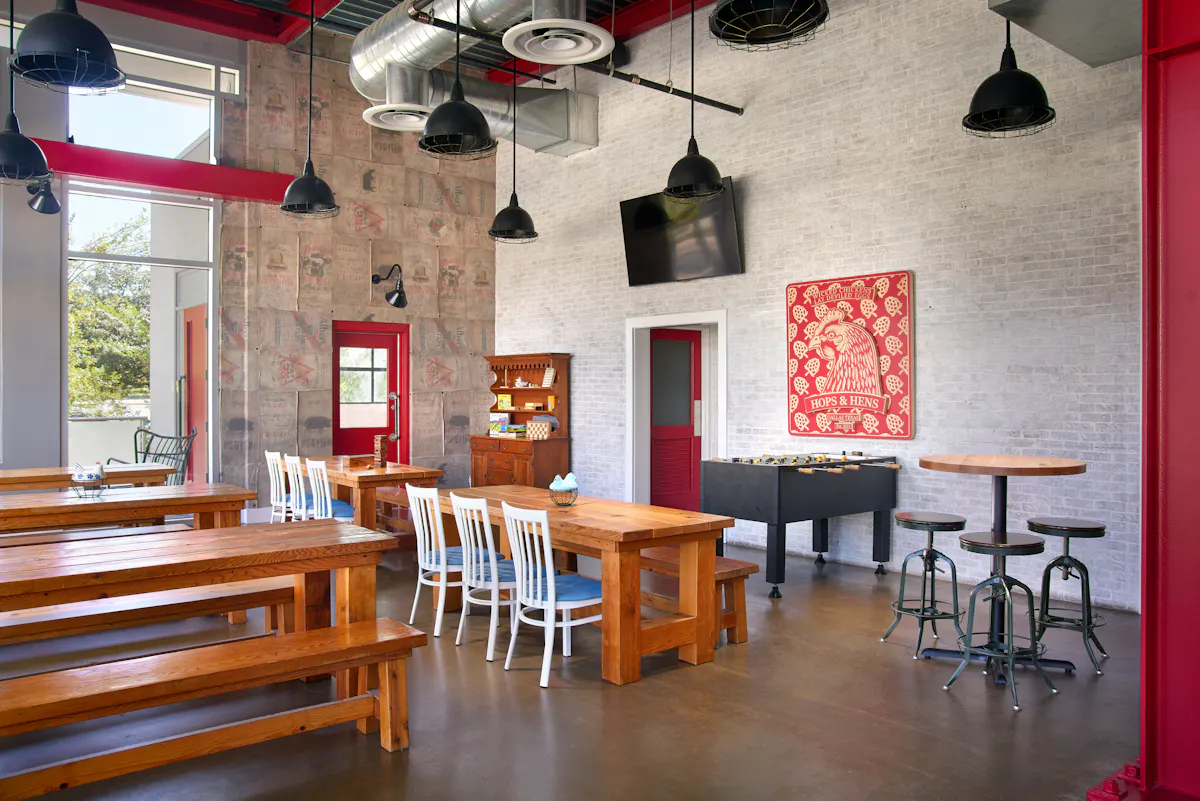 a room with tables and chairs